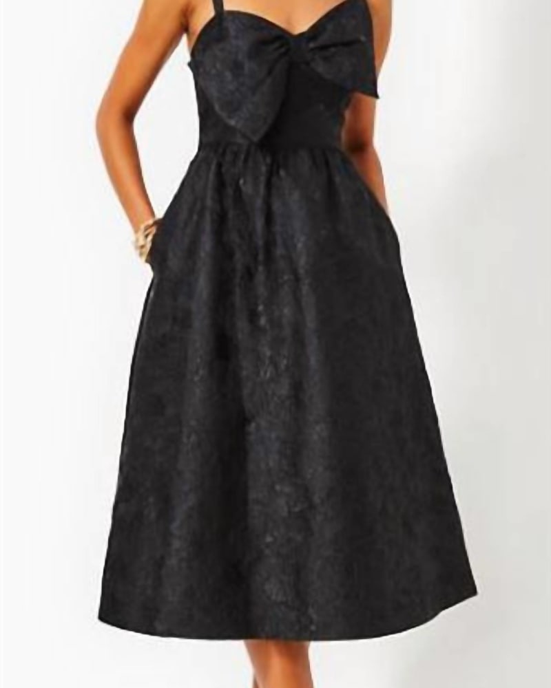 Front of a model wearing a size 10 Ellara Jacquard Midi Bow Dress In Onyx Leaf An Impression Jacquard in Onyx Leaf An Impression Jacquard by Lilly Pulitzer. | dia_product_style_image_id:346642